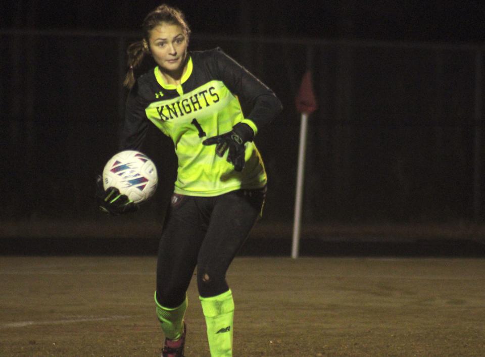 Creekside goalkeeper Hailey Smith (1) prepares to roll the ball out to a defender against Bartram Trail.