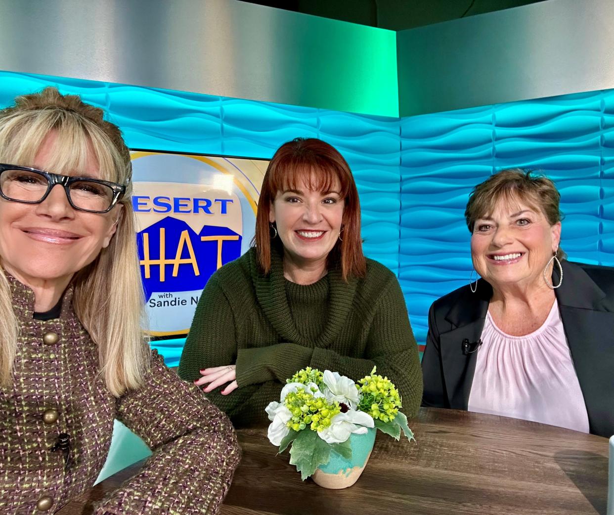 Sandie Newton speaks with Gina Rotolo, AAUW board member, and Kathi Farber, AAUW Palm Sprpings president.