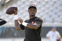 Cleveland Browns quarterback Deshaun Watson (4) warms up before an NFL preseason football game against the Jacksonville Jaguars, Friday, Aug. 12, 2022, in Jacksonville, Fla. (AP Photo/Phelan M. Ebenhack)