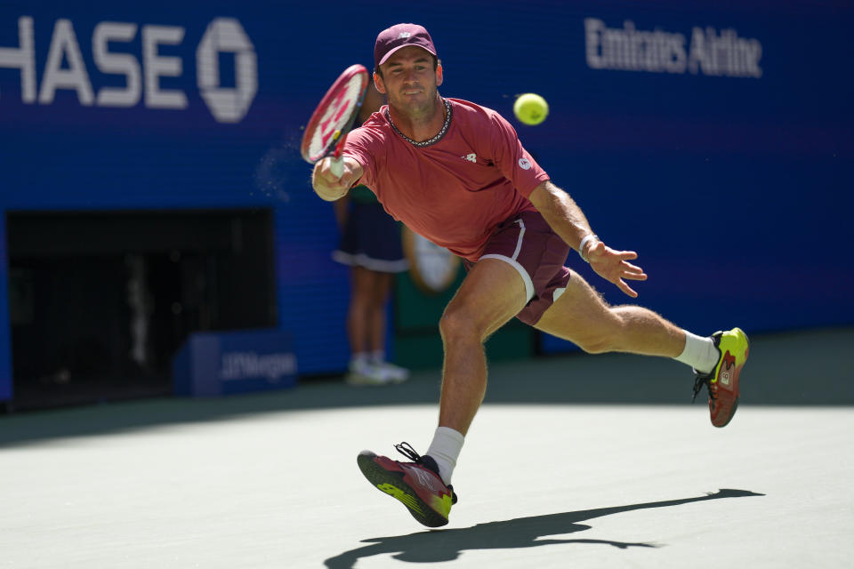 Tommy Paul, of the United States, returns a shot to Alejandro Davidovich Fokina, of Spain, during the third round of the U.S. Open tennis championships, Friday, Sept. 1, 2023, in New York. (AP Photo/Manu Fernandez)