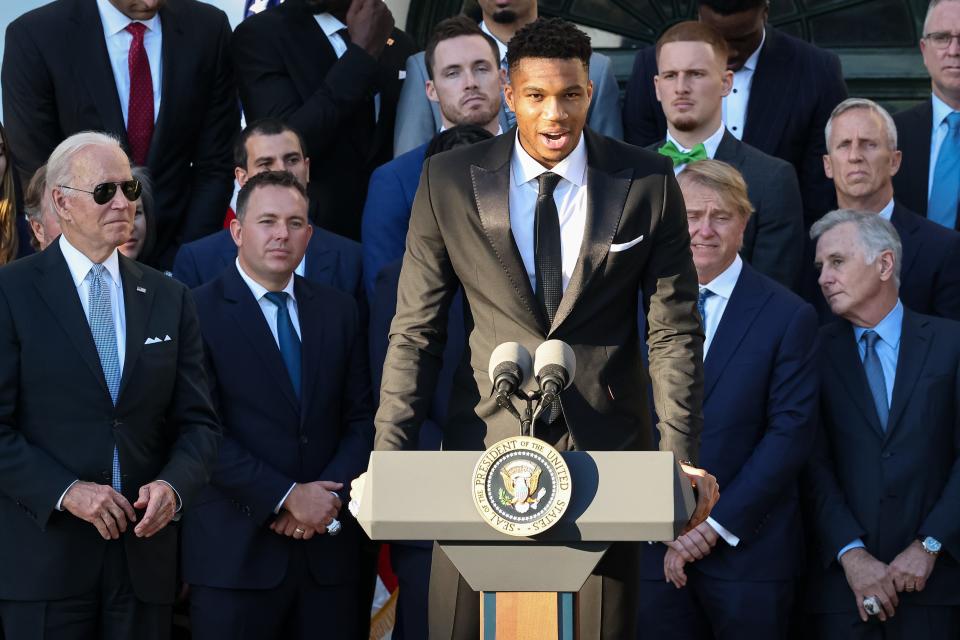 Giannis Antetokounmpo of the Milwaukee Bucks speaks as President Joe Biden welcomes the Milwaukee Bucks to the South Lawn of the White House to honor the team for its NBA Championship.