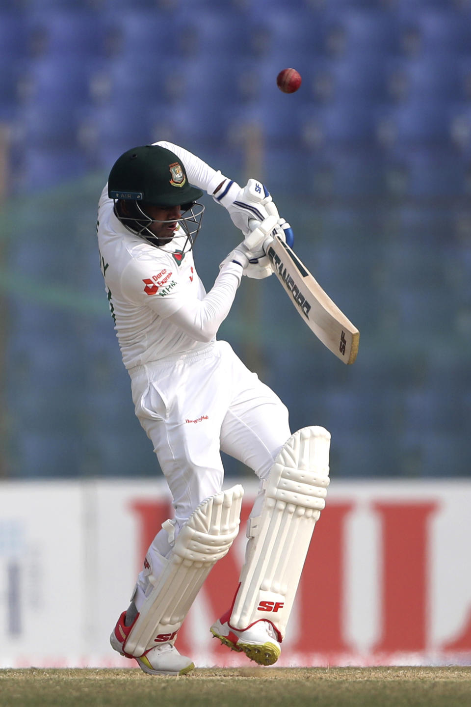 Bangladesh's Mehidy Hasan Miraz plays shot during the first Test cricket match day third between Bangladesh and India in Chattogram Bangladesh, Friday, Dec. 16, 2022. (AP Photo/Surjeet Yadav)