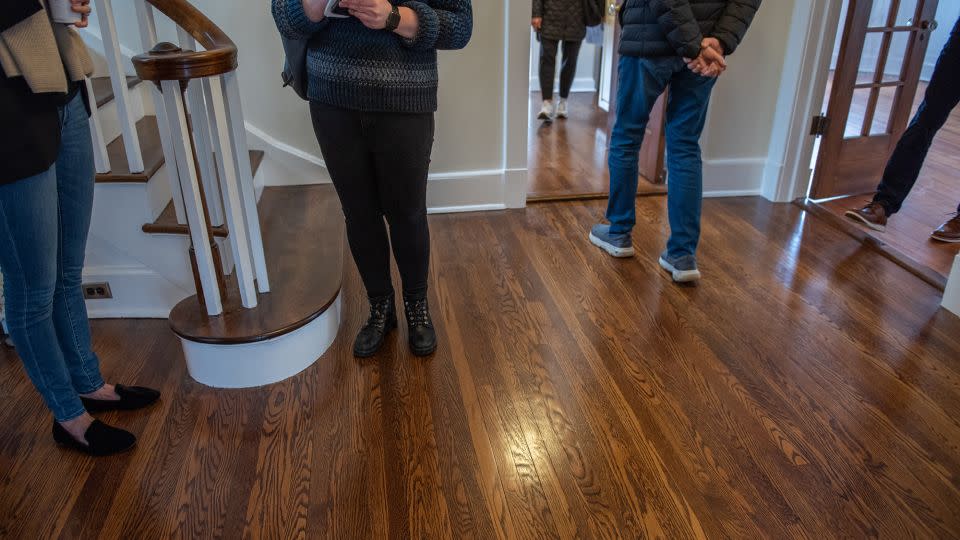 Prospective buyers attend an open house at a home for sale in Larchmont, New York, US, on Sunday, Jan. 22, 2023. Beginning on August 17, those interested in touring a house with a Realtor must first sign a buyer representation agreement. - Tiffany Hagler-Geard/Bloomberg/Getty Images