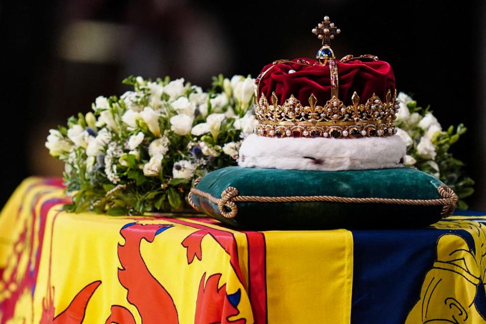 The Crown of Scotland sits atop the coffin of Queen Elizabeth II inside St Giles Cathedral in Edinburgh on Sept. 12, 2022, during a service of Thanksgiving for her life.