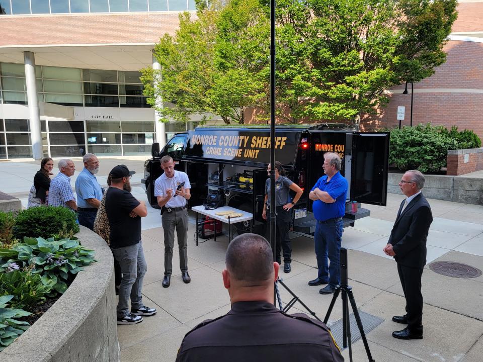 Members of the Monroe County Board of Commissioners take a look at the Crime Scene Unit and the Oscar 360 system.