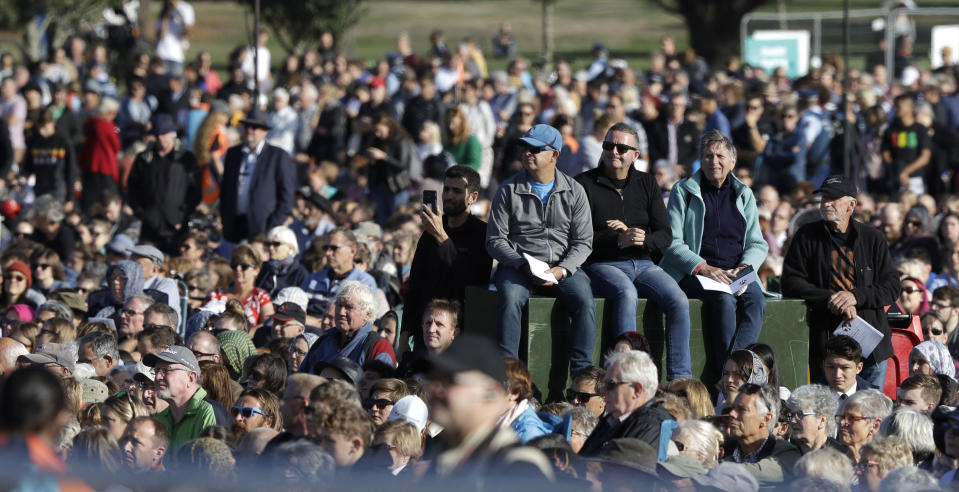 People listen during a National Remembrance Service in Hagley Park for the victims of the March 15 mosques terrorist attack in Christchurch, New Zealand, Friday, March 29, 2019. (AP Photo/Mark Baker)