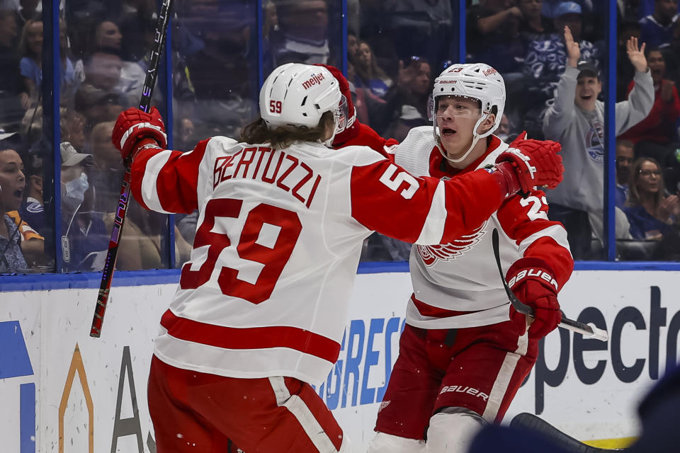 Lucas Raymond #23 of the Detroit Red Wings and teammate Tyler Bertuzzi #59 have fantasy value