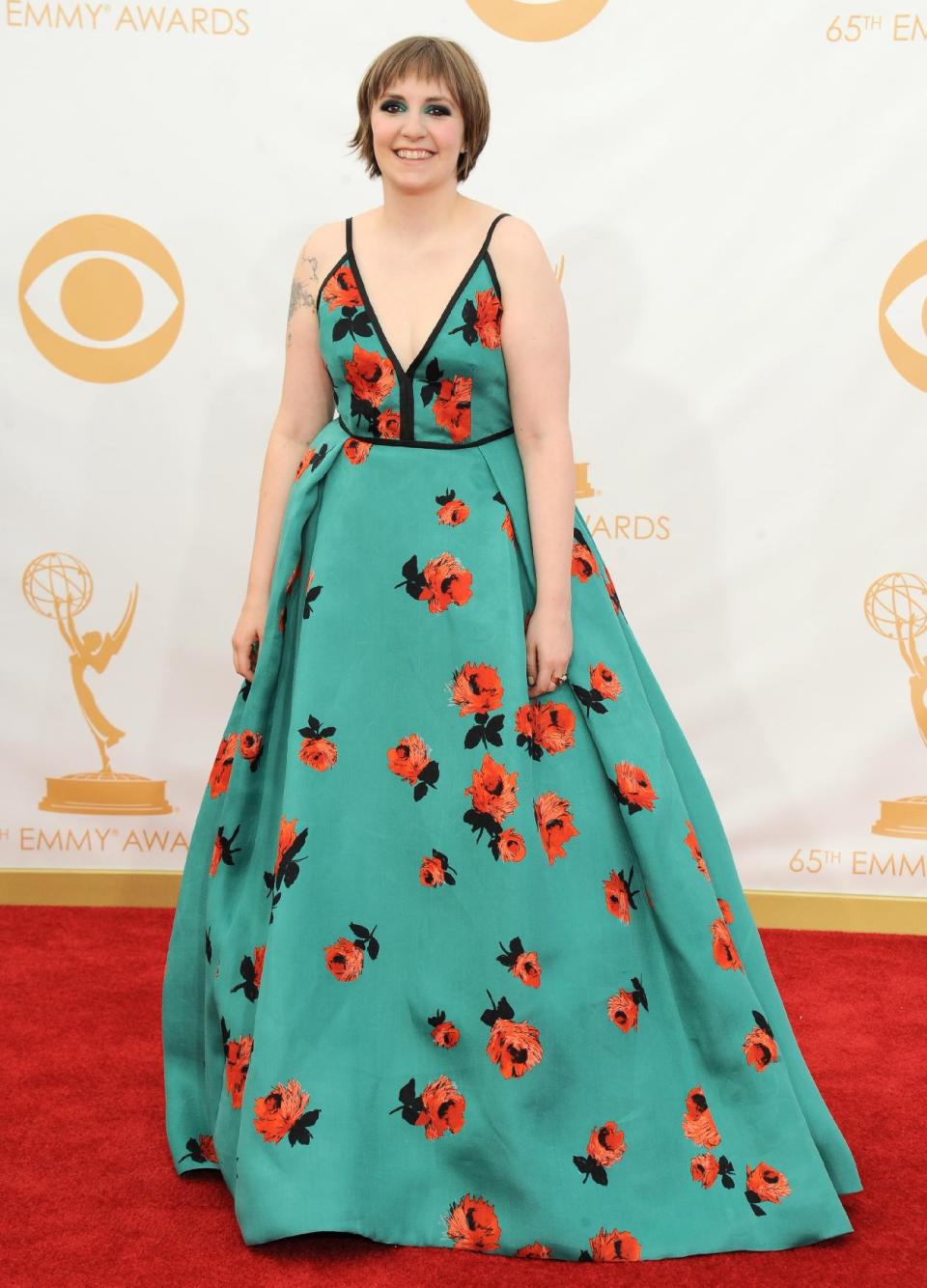 Lena Dunham arrives at the 65th Primetime Emmy Awards at Nokia Theatre on Sunday Sept. 22, 2013, in Los Angeles. (Photo by Jordan Strauss/Invision/AP)