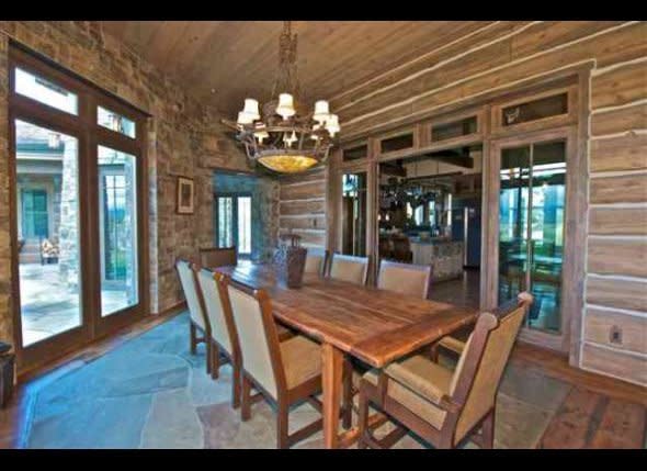 A dining area is sectioned off by interior sliding doors.