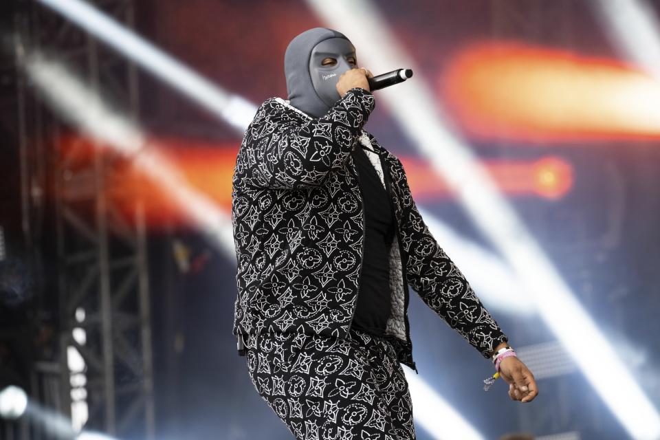 <p>M Huncho performs at the Wireless Music Festival, Crystal Palace Park, London, England, Sunday, Sep. 12, 2021. (AP Photo/Scott Garfitt)</p>
