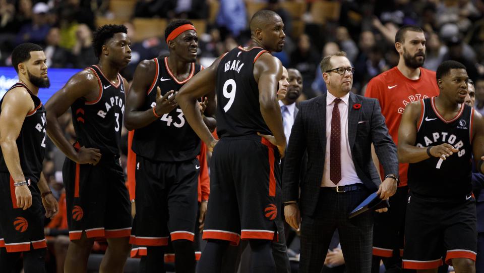 TORONTO, ON - NOVEMBER 06: Toronto Raptors Head Coach Nick Nurse stands amongst his team, (L-R) Fred VanVleet #23, OG Anunoby #3, Pascal Siakam #43, Serge Ibaka #9 and Kyle Lowry #7 as a call is disputed during second half of their NBA game against the Sacramento Kings at Scotiabank Arena on November 6, 2019 in Toronto, Canada. NOTE TO USER: User expressly acknowledges and agrees that, by downloading and or using this photograph, User is consenting to the terms and conditions of the Getty Images License Agreement. (Photo by Cole Burston/Getty Images)