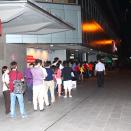 Customers wait in line for the launch of the GALAXY S III at SingTel, ComCentre