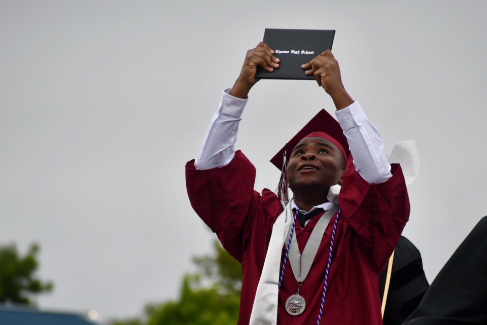 Amari Tyler celebrates earning his diploma at Nipomo High School’s commencement ceremony on June 9.
