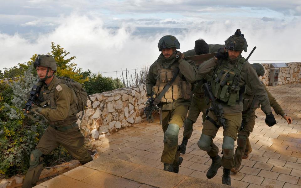 Israeli soldiers take part in military rescue exercise in Upper Galilee near the Lebanon border