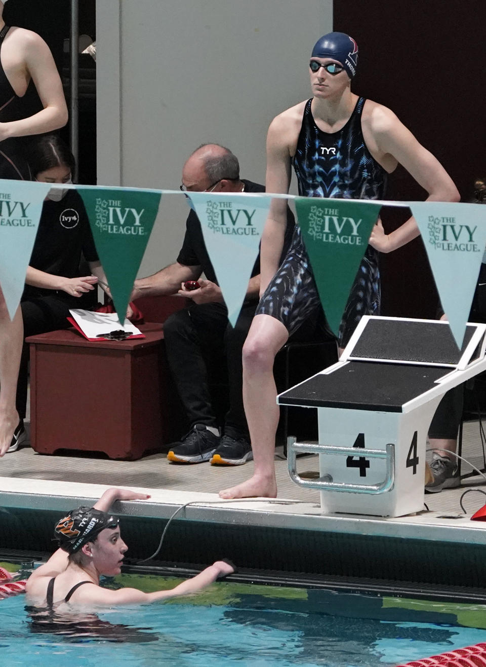 Penn's Lia Thomas waits to compete in a qualifying heat of the 500 yard freestyle event at the Ivy League Women's Swimming and Diving Championships at Harvard University, Thursday, Feb. 17, 2022, in Cambridge, Mass. Thomas, who is transitioning to female, is swimming for the University of Pennsylvania's women's team. (AP Photo/Mary Schwalm)