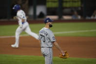 Los Angeles Dodgers' Will Smith rounds the bases after a home run off Tampa Bay Rays relief pitcher Nick Anderson during the sixth inning in Game 2 of the baseball World Series Wednesday, Oct. 21, 2020, in Arlington, Texas. (AP Photo/Eric Gay)