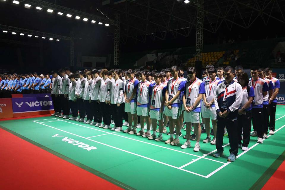 <p>PBSI via AP</p> Players and officials observing a moment of silence on July 1, 2024