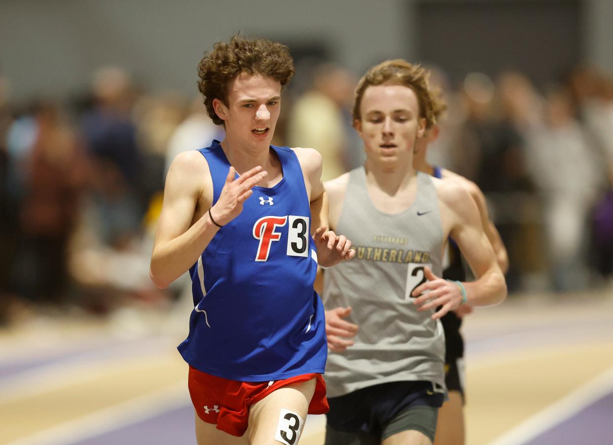 Fairport’s Jake Passalugo finished strong to beat Pittsford Sutherland's William Tempest in the 3,200-meter race.