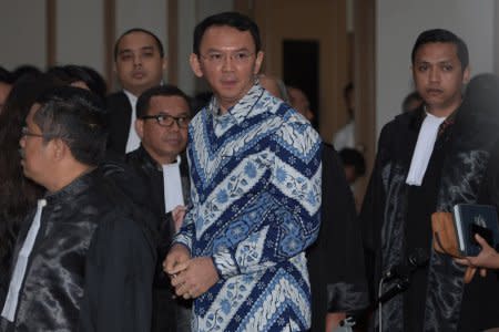 FILE PHOTO: Jakarta Governor Basuki Tjahaja Purnama is seen inside a court during his trial for blasphemy in Jakarta, Indonesia May 9, 2017 in this photo taken by Antara Foto. Antara Foto/ Sigid Kurniawan/via REUTERS