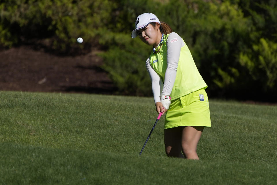 Ayaka Furue chips onto the ninth green during the final round of the LPGA Bank of Hope Match Play golf tournament Sunday, May 28, 2023, in North Las Vegas, Nev. (AP Photo/John Locher)