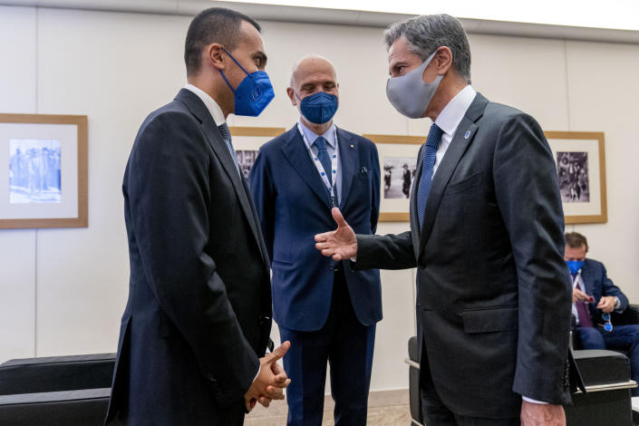 U.S. Secretary of State Antony Blinken, right, speaks with Italy's Foreign Minister Luigi Di Maio, left, as he arrives at a G20 foreign ministers meeting in Matera, Italy, Tuesday, June 29, 2021. Blinken is on a week long trip in Europe traveling to Germany, France and Italy. (AP Photo/Andrew Harnik, Pool)