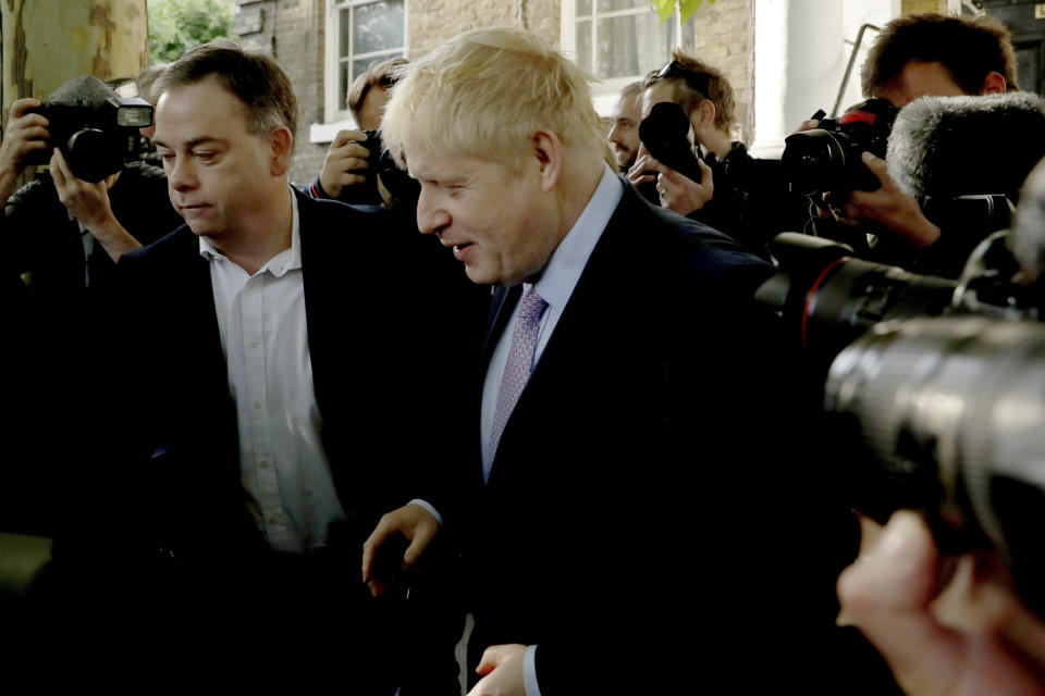 British Conservative party leadership contender Boris Johnson gets in a car as he leaves his home in south London, Tuesday, June 18, 2019. Contenders for leadership in Britain's ruling Conservative Party to become the next Prime Minister, jostled for attention Monday as the race narrowed into a contest to seize the mantle of challenger to front-runner Boris Johnson. (AP Photo/Matt Dunham)