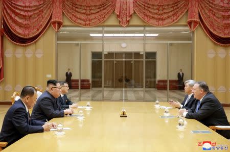 North Korean leader Kim Jong Un meets with U.S. Secretary of State Mike Pompeo in this May 9, 2018 photo released by North Korea's Korean Central News Agency (KCNA) in Pyongyang May 10, 2018. KCNA / via REUTERS