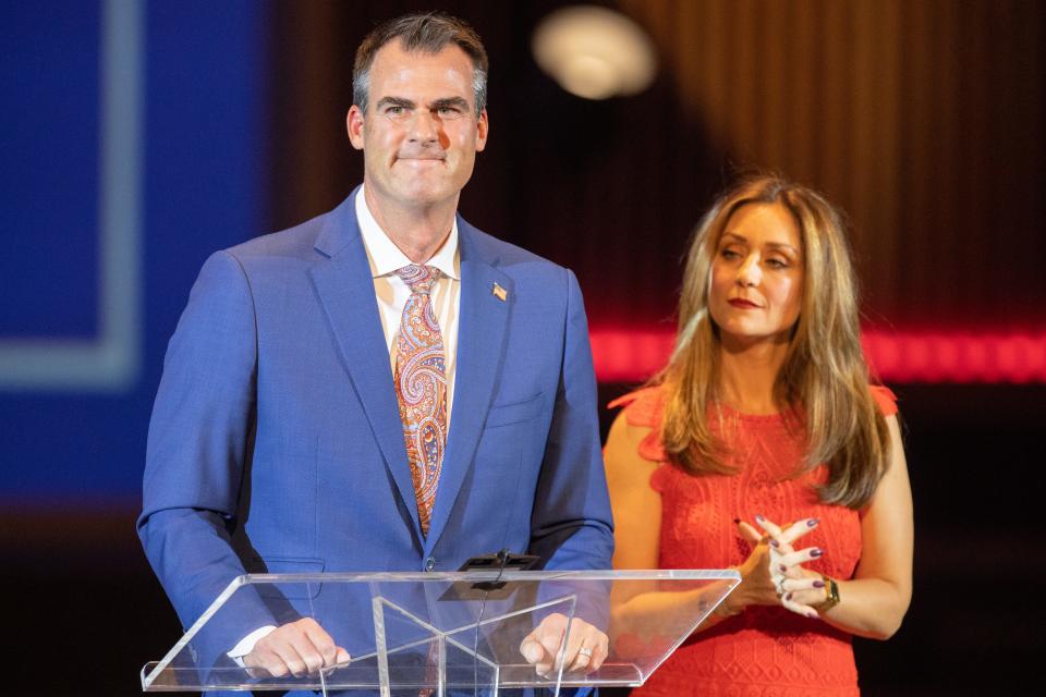 Oklahoma Gov. Kevin Stitt speaks Tuesday, Nov. 1, 2022, at a rally in support of his reelection, alongside his wife, Sarah Stitt, at Crossroads Church in Oklahoma City.