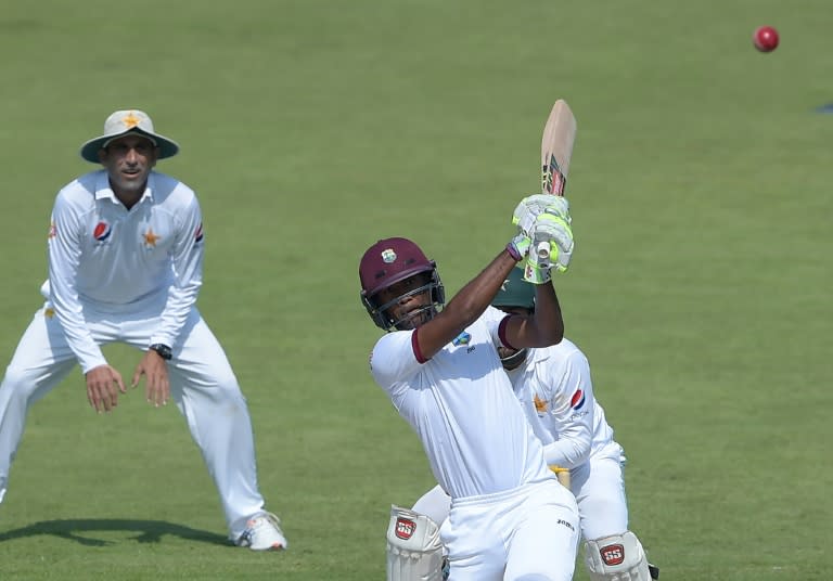 West Indies' batsman Kraigg Brathwaite hits a boundary on the second day of the third and final Test against Pakistan in Sharjah on October 31, 2016