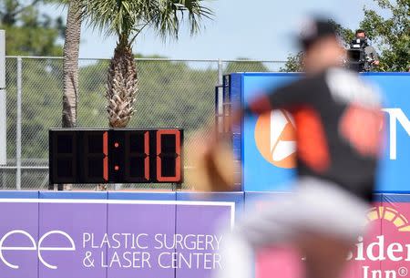 A general view of the pitch clock as Miami Marlins starting pitcher David Phelps (41) throws against the New York Mets during the spring training baseball game at Tradition Field in Port St. Lucie, Florida, in this March 9, 2015, file photo. Mandatory Credit: Brad Barr-USA TODAY Sports