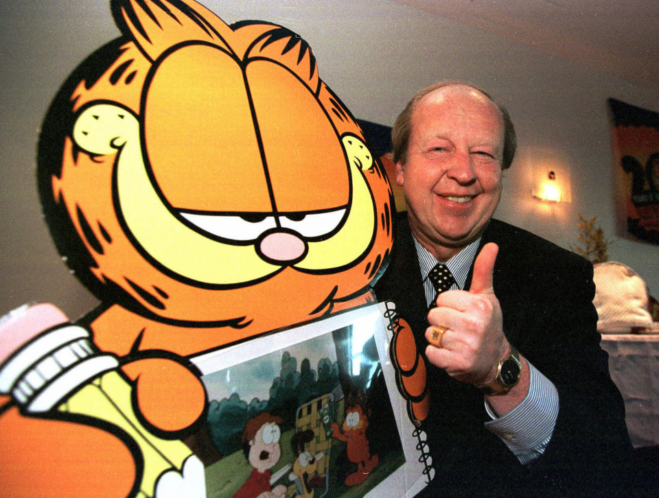 Garfield und sein Erfinder Jim Davis. (Bild: Action Press)