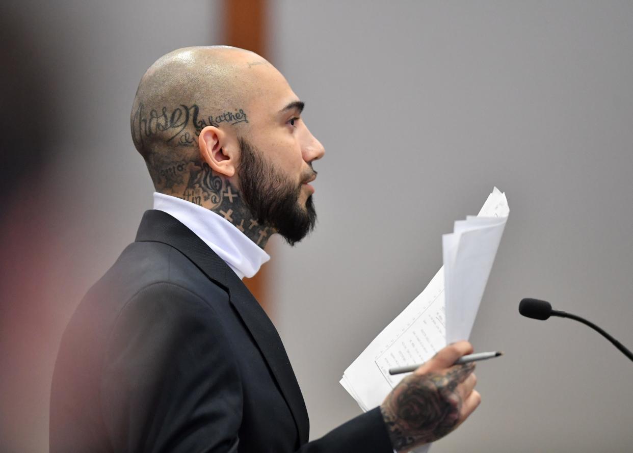Juan Salazar-Diaz cross examines a witness Tuesday in court. Salazar-Diaz is acting as his own attorney in his trial for the September 2018 murder of Tyren Kinard in North Port.