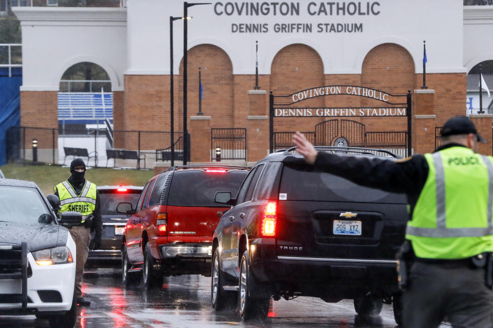 Students arrive at Covington Catholic High School as classes resume following a closing due to security concerns the previous day, Wednesday, Jan. 23, 2019, in Park Hills, Ky. Local police authorities controlled access to the property at entrances and exits. (AP Photo/John Minchillo)