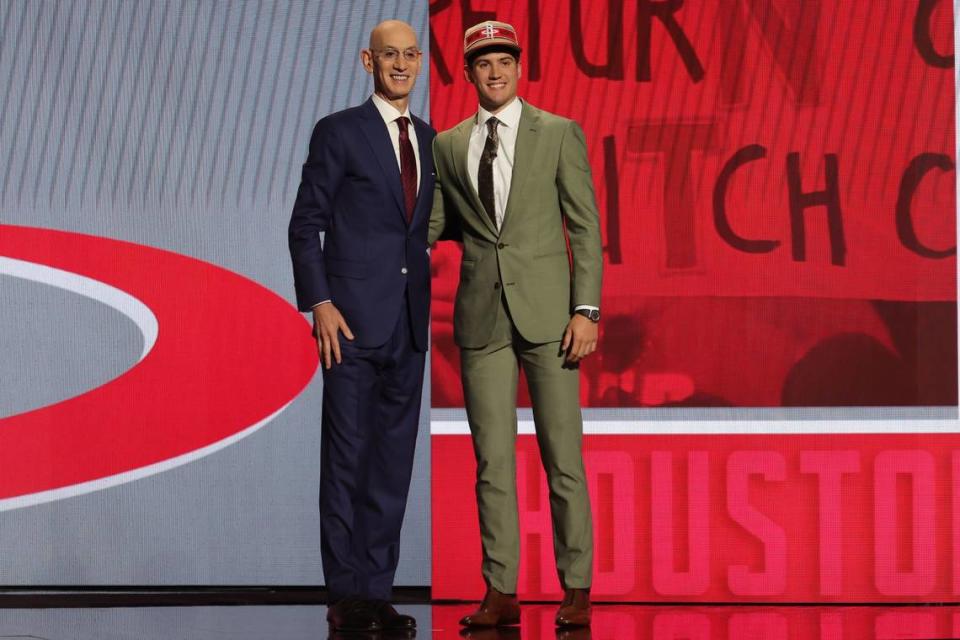 Former Kentucky star Reed Sheppard poses for photos with NBA commissioner Adam Silver after being selected in the first round by the Houston Rockets in the 2024 NBA Draft at Barclays Center in Brooklyn, New York.