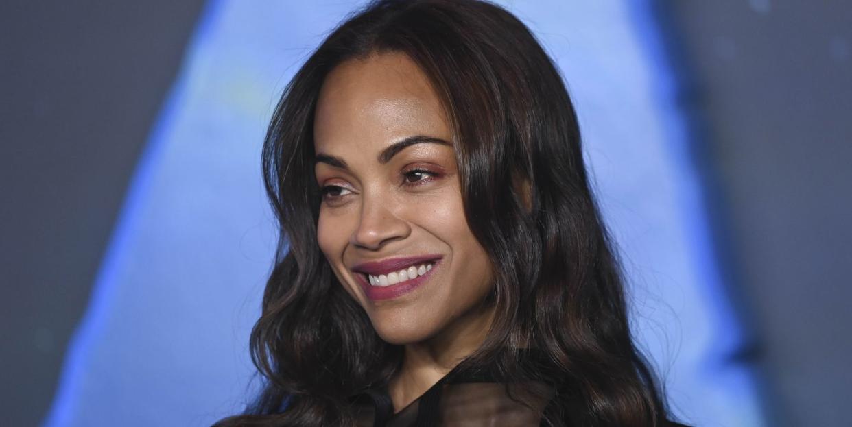 zoe saldana debuts new micro fringe hair transformation