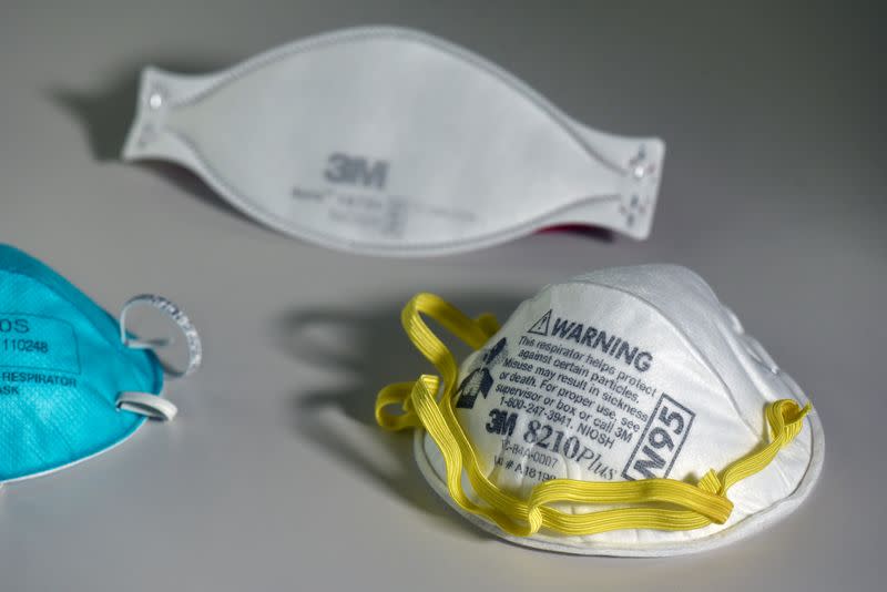 FILE PHOTO: Various N95 respiration masks at a laboratory of 3M, that has been contracted by the U.S. government to produce extra marks in response to the country's novel coronavirus outbreak, in Maplewood, Minnesota