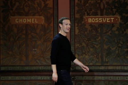 Facebook Chairman and CEO Mark Zuckerberg addresses the audience in Georgetown University's Institute of Politics and Public Service in Washington
