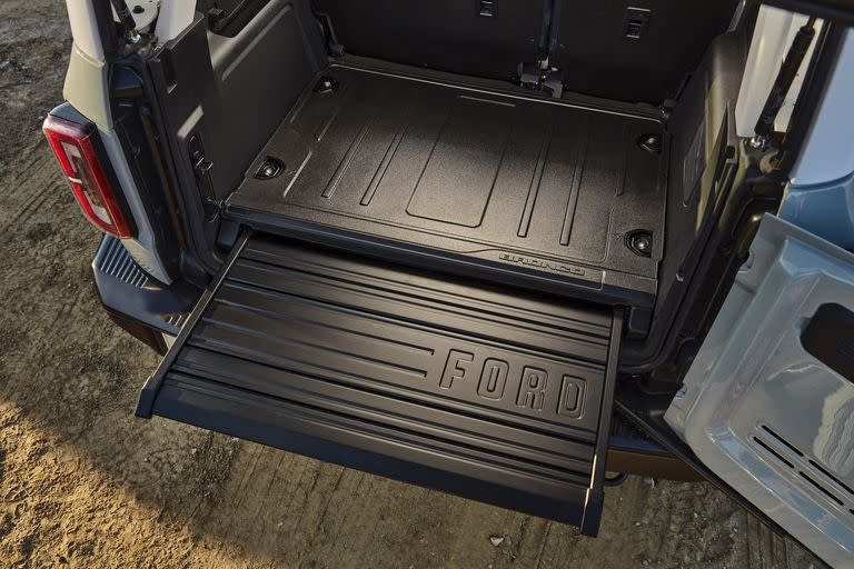 <p>There's plenty of hidden utilities throughout the Bronco, including this slide-out tray for cargo or seating. </p>