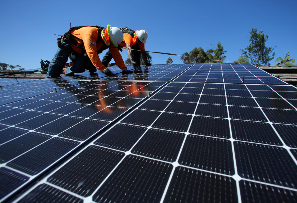 Rewiring America's plan calls for the federal government to guarantee low-cost financing for rooftop solar the same way it does for home buying.  (Photo: Mike Blake / Reuters)