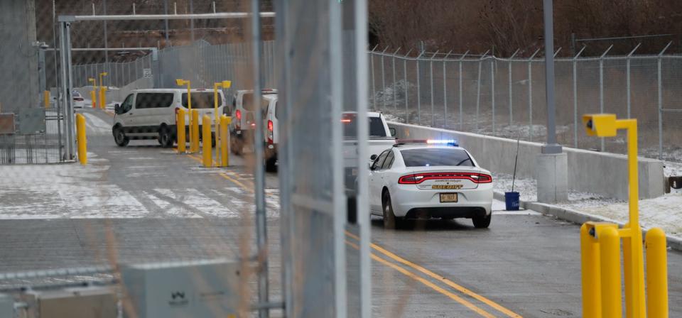 The Marion County Sheriff’s Office transfers inmates from the Marion County Jail to the Adult Detention Center located at the Community Justice Campus on Saturday, Jan. 15, 2022, in Indianapolis. 