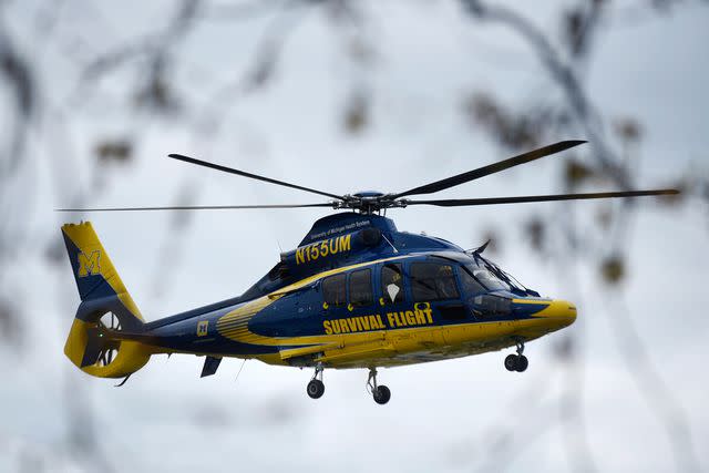 <p>Kathleen Kildee/Detroit News via AP</p> Helicopters transported victims of the April 20 Swan Creek Boat Club crash to nearby hospitals