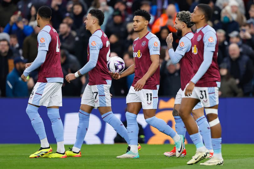 Aston Villa players celebrate against Chelsea