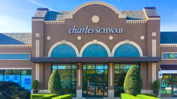 Irving, Tx: Entrance facade of Charles Schwab branch office nice trim landscape.