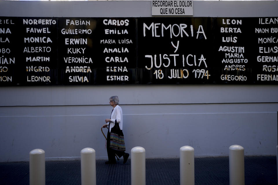 The names of people who died in the bombing of the AMIA Jewish center are on display at the site of the attack in Buenos Aires, Argentina, Tuesday, Jan. 23, 2024. The 1994 attack killed 85 people. (AP Photo/Natacha Pisarenko)