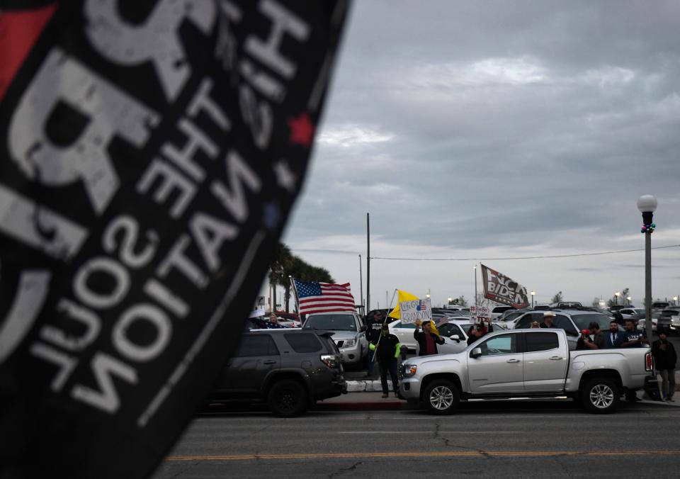 Counter protesters are seen across the street from Texas governor candidate Beto O'Rourke's campaign event, Thursday, Nov. 18, 2021, at La Playa by the Bay. O'Rourke is traveling to Fort Stockton, San Antonio, Laredo and the Rio Grande Valley.