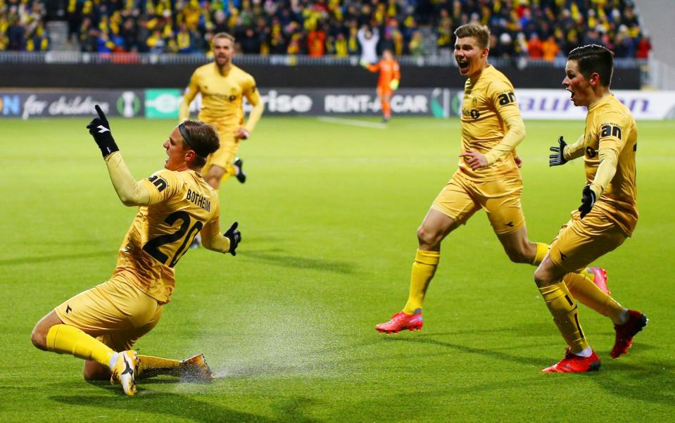 Bodo Glimt's Erik Botheim, left, celebrates with teammates after scoring during the Europa conference league soccer match between Bodo Glimt and Roma at Aspmyra stadium in Bodo, Norway, Thursday, Oct. 21, 2021. - AP