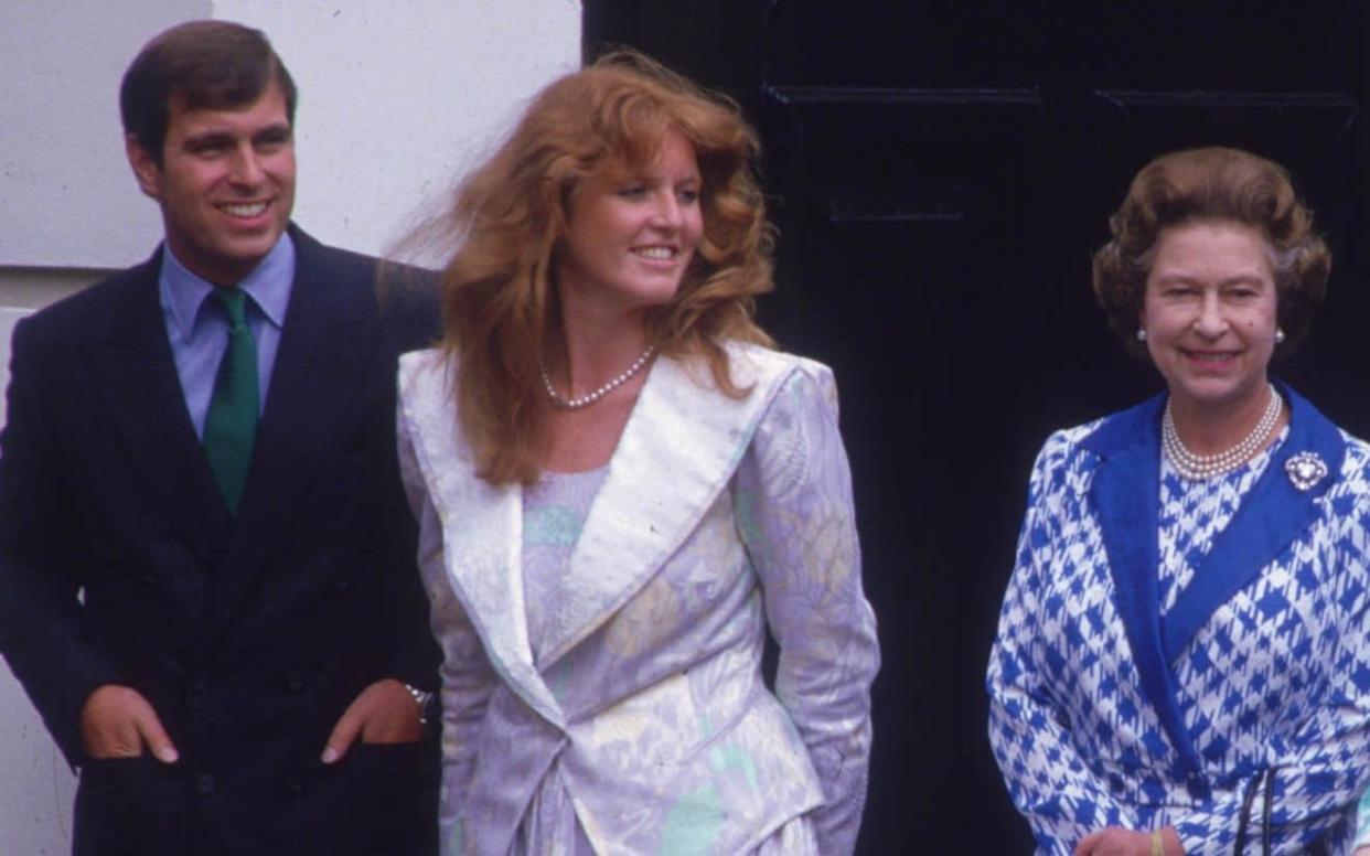 The Duke and Duchess of York pictured with Queen Elizabeth II in 1986 - Hulton Archive