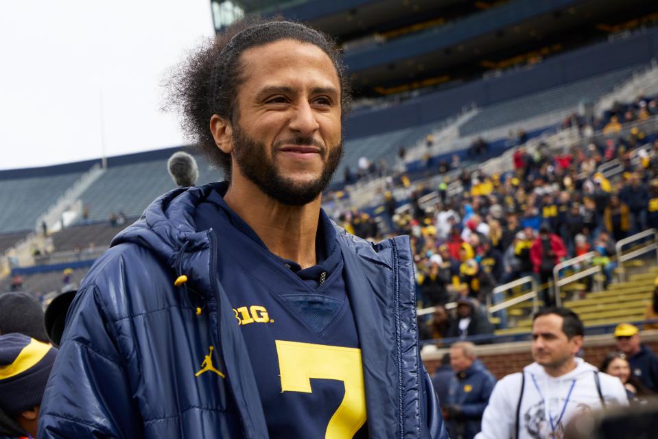 Colin Kaepernick on the sideline before the Michigan Wolverines' spring game at Michigan Stadium on April 2, 2022.