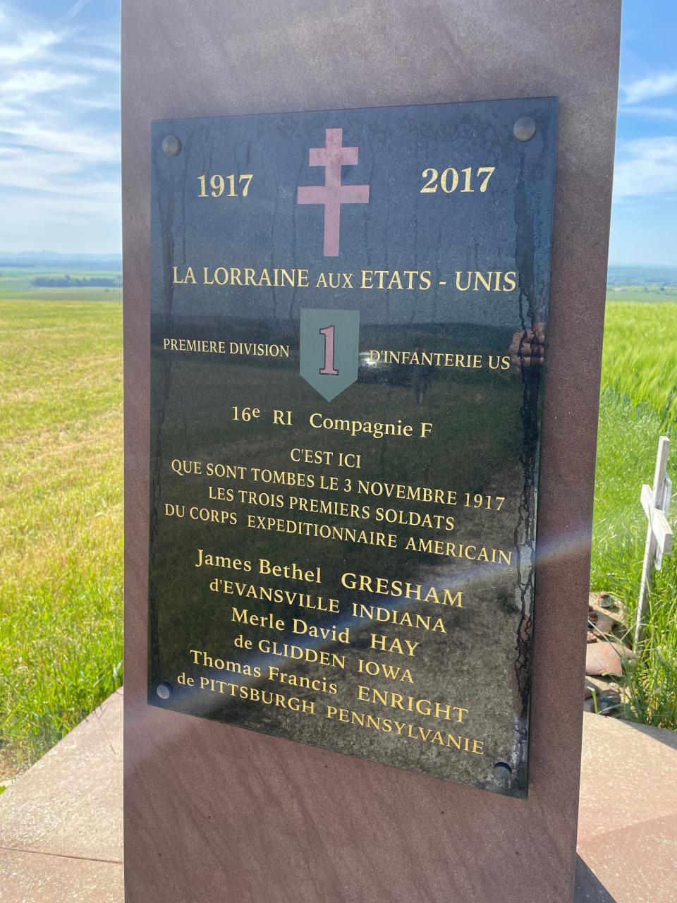 The historical marker on the Bathelemont World War I Memorial in France.