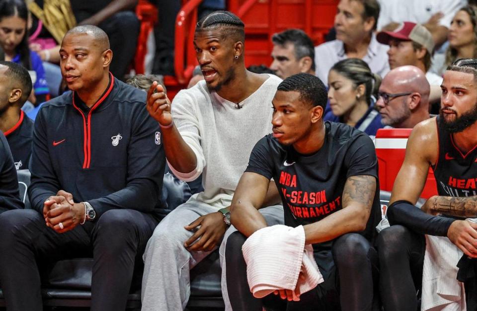 Miami Heat forward Jimmy Butler (22) gesture from the bench during the game against the Milwaukee Bucks at the Kaseya Center in Miami on Tuesday, November 28, 2023.